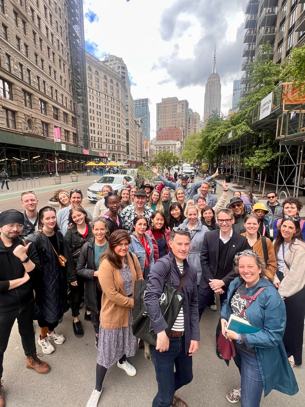 group photo of placemaking practitioners together on a tour of public space in New York City