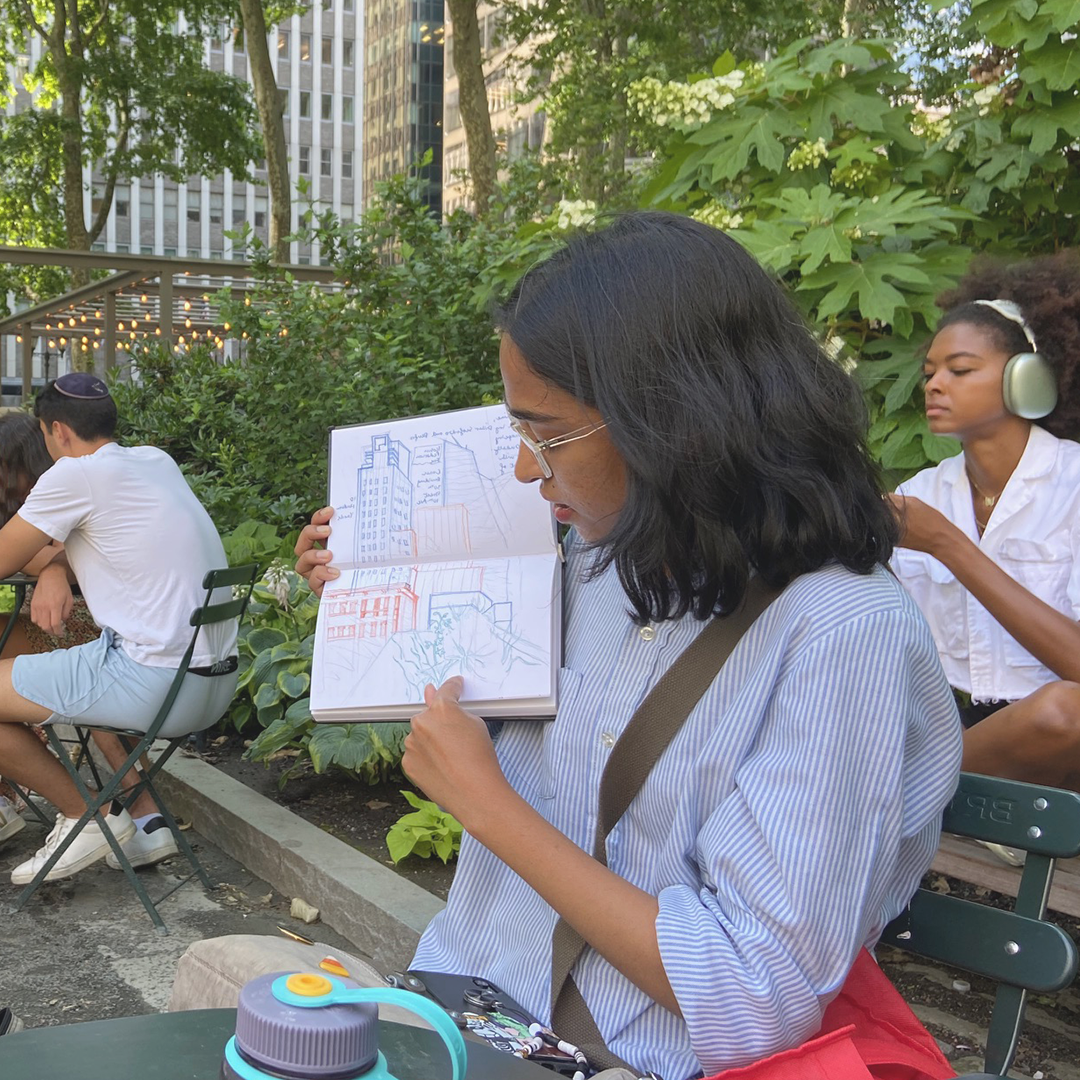 GCPE student sharing sketches made during an Historic Preservation class.