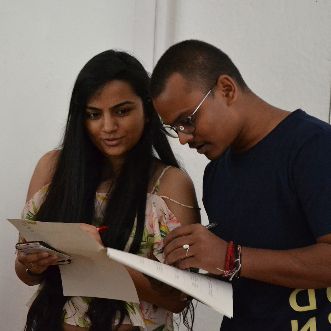 Two students completing a worksheet together for the Graduate Center for Planning and the Environment.